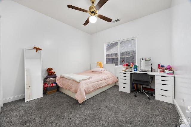 bedroom with visible vents, dark carpet, ceiling fan, and baseboards