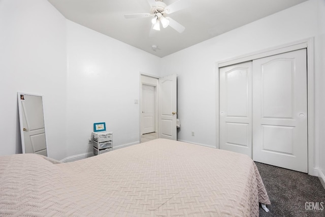 bedroom with carpet floors, a closet, baseboards, and a ceiling fan