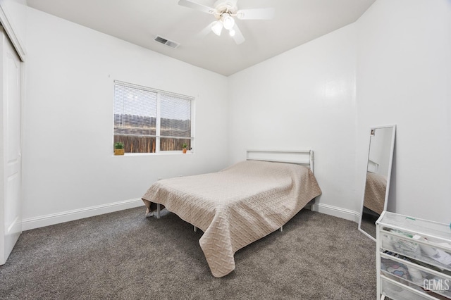 bedroom featuring ceiling fan, baseboards, visible vents, and dark carpet