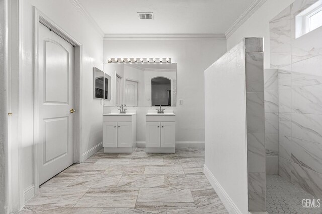 full bathroom featuring marble finish floor, a sink, visible vents, and crown molding