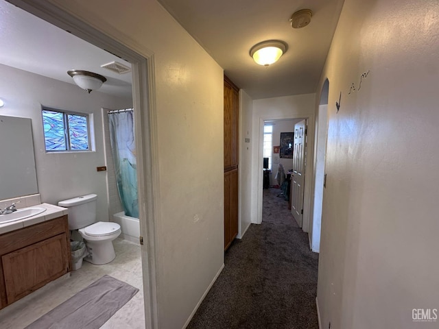 325 Terriwood Ave, Bakersfield, CA 93308 - hallway with sink and light colored carpet