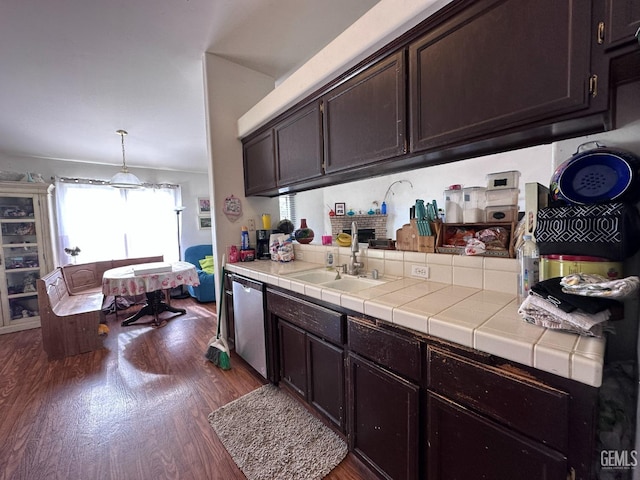325 Terriwood Ave, Bakersfield, CA 93308 - kitchen with decorative light fixtures, sink, stainless steel dishwasher, tile counters, and dark brown cabinetry