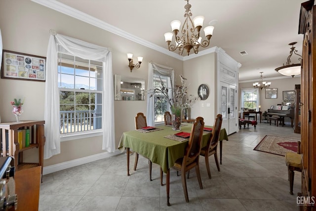 dining room with a chandelier, light tile patterned floors, and ornamental molding