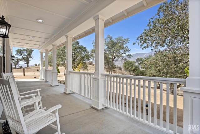 view of patio featuring a porch