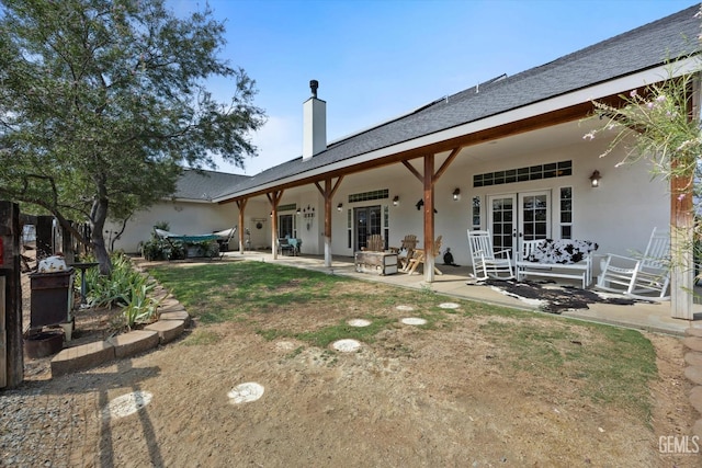 rear view of house with a patio area