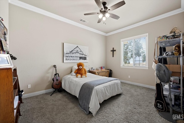 bedroom featuring carpet flooring, ceiling fan, and crown molding