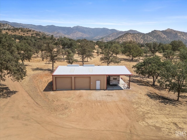 exterior space featuring a mountain view and a rural view