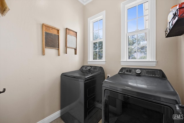 washroom with washer and clothes dryer