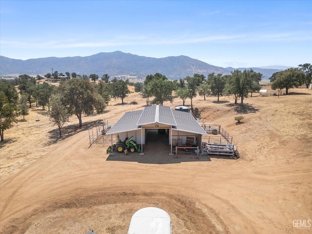 bird's eye view featuring a mountain view and a rural view