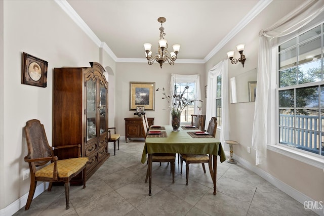 dining room featuring ornamental molding, light tile patterned floors, an inviting chandelier, and a healthy amount of sunlight