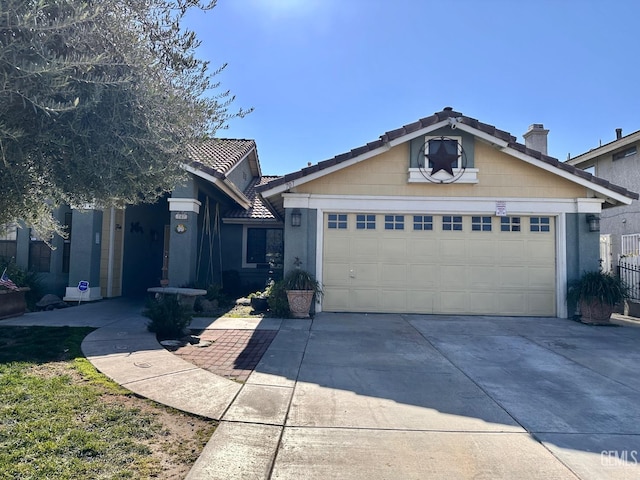 ranch-style house featuring a garage