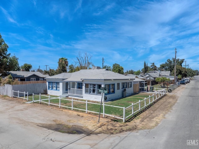 ranch-style home with a front yard