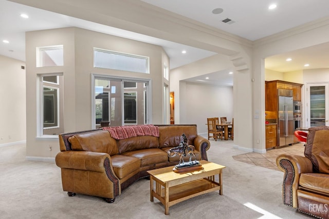 carpeted living room with crown molding