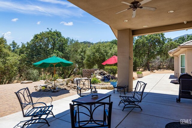 view of patio / terrace with ceiling fan