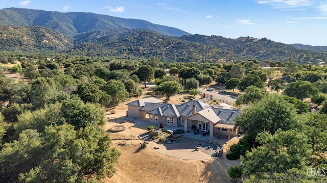 drone / aerial view featuring a mountain view