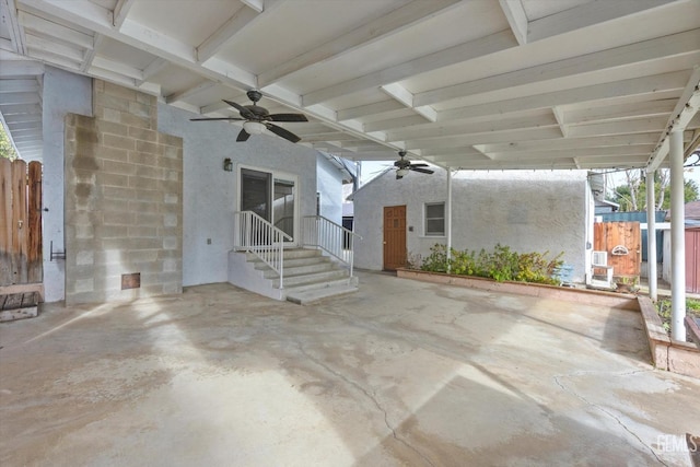 view of patio featuring ceiling fan