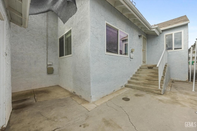 view of home's exterior with a patio