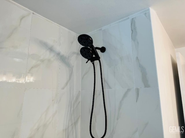 room details with a marble finish shower