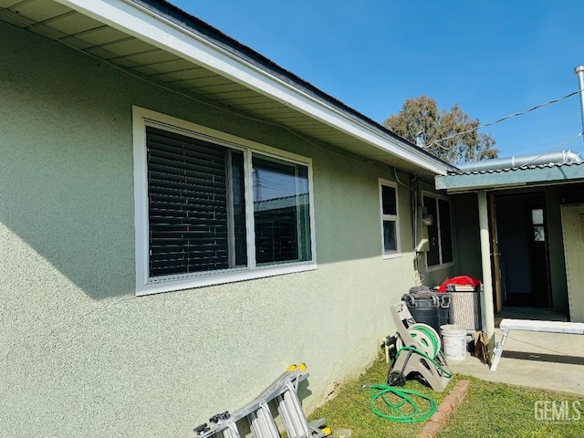 view of home's exterior with stucco siding