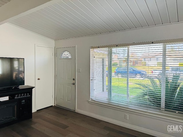 entryway with vaulted ceiling with beams, wood ceiling, baseboards, and dark wood finished floors