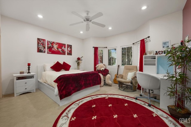 carpeted bedroom featuring ceiling fan