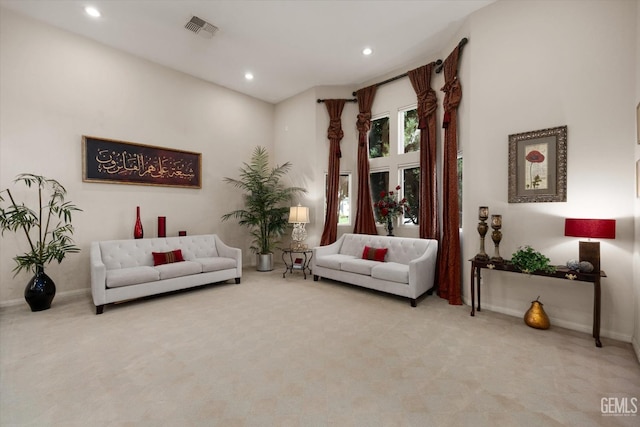 living area with carpet