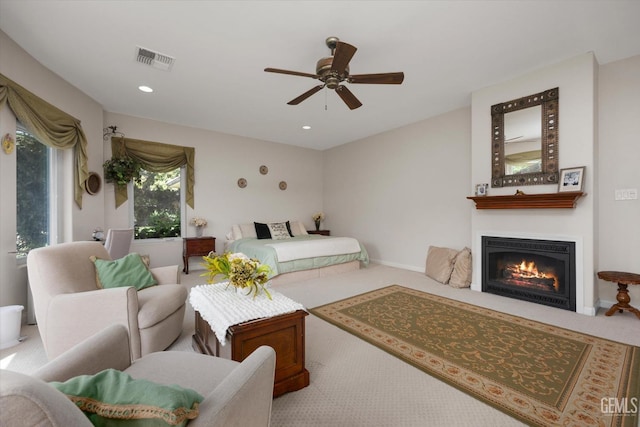 carpeted bedroom featuring ceiling fan