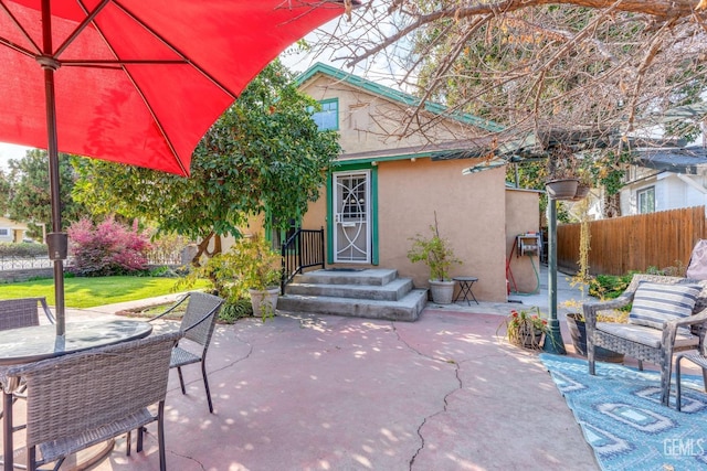 view of patio with fence