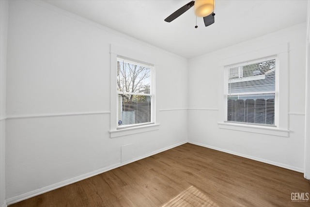 spare room featuring ceiling fan and wood-type flooring