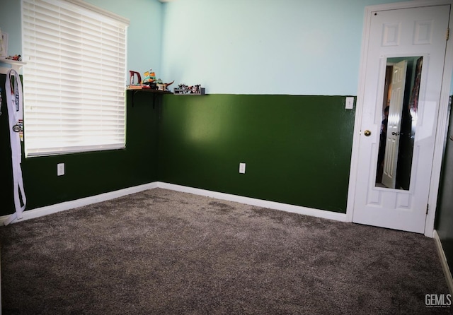 view of carpeted spare room