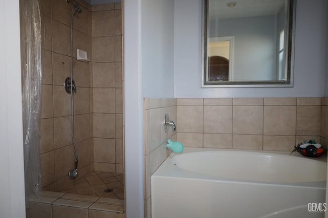 bathroom featuring plus walk in shower