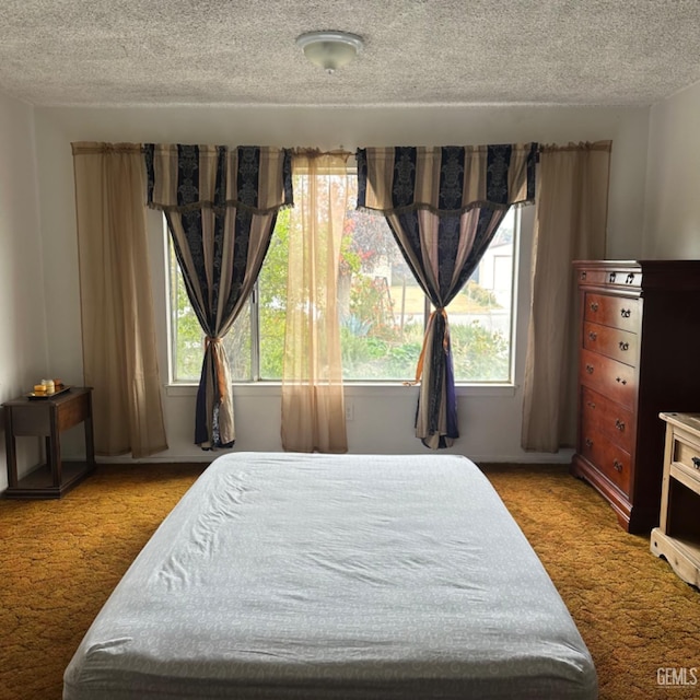 bedroom featuring multiple windows and light carpet