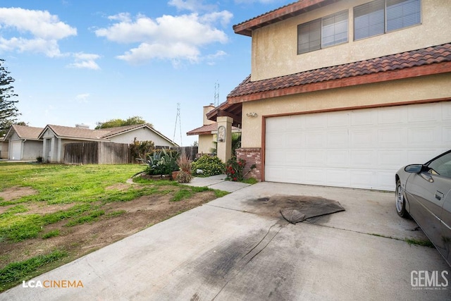 11705 Cactus Dr, Bakersfield, CA 93312 - view of side of home featuring a tiled roof, concrete driveway, stucco siding, and brick siding