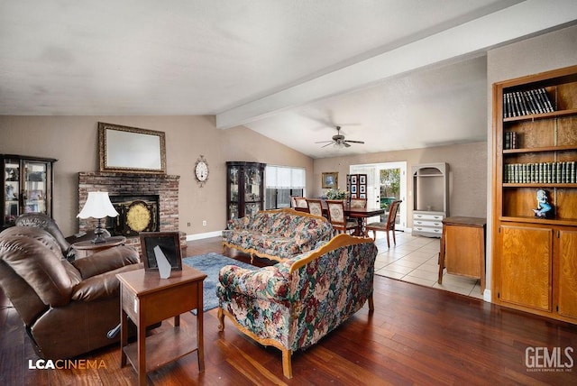 11705 Cactus Dr, Bakersfield, CA 93312 - living area with a fireplace, a ceiling fan, dark wood-type flooring, and baseboards
