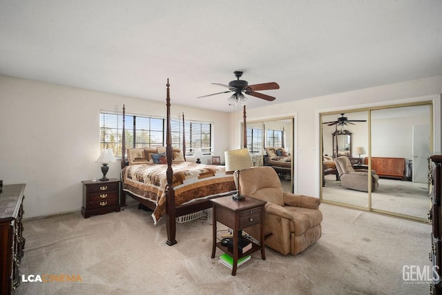 11705 Cactus Dr, Bakersfield, CA 93312 - bedroom with light colored carpet, two closets, ceiling fan, and baseboards