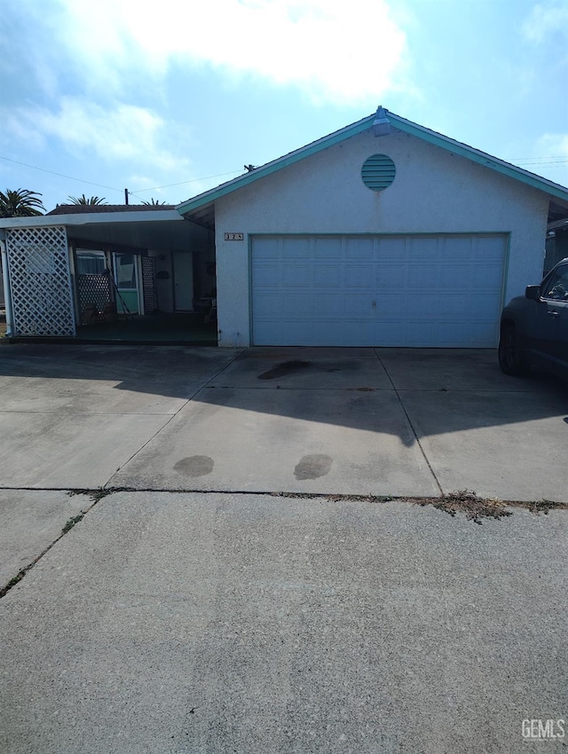 328 N X St, Lompoc, CA 93436 - single story home with driveway, stucco siding, and a garage