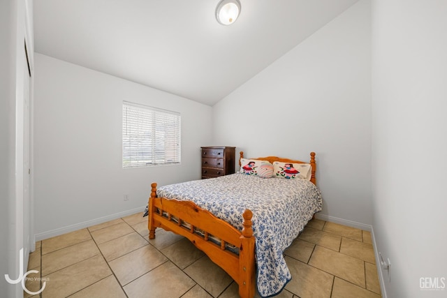 408 Isla Bonita St, Bakersfield, CA 93307 - bedroom with vaulted ceiling and light tile patterned flooring