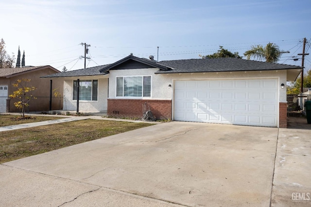 ranch-style home featuring a garage