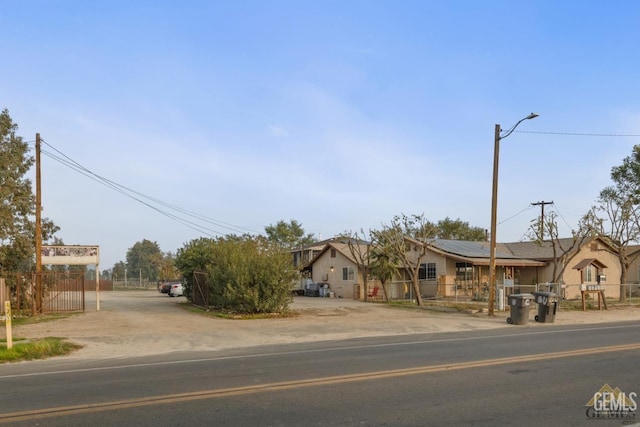 view of front of property with solar panels