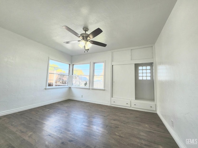 209 Bedford Way, Bakersfield, CA 93308 - spare room featuring a ceiling fan, plenty of natural light, and dark wood-style floors