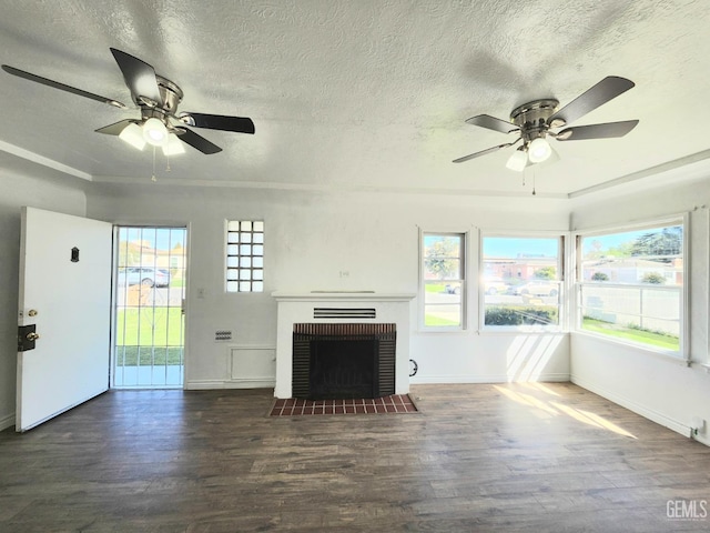 209 Bedford Way, Bakersfield, CA 93308 - unfurnished living room featuring a fireplace, wood finished floors, a ceiling fan, and a textured ceiling