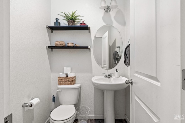 5906 Commonwealth Ave, Bakersfield, CA 93313 - half bath featuring toilet and a sink