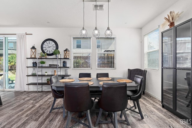 5906 Commonwealth Ave, Bakersfield, CA 93313 - dining space featuring wood finished floors