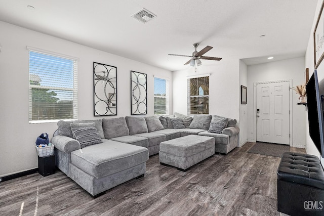 5906 Commonwealth Ave, Bakersfield, CA 93313 - living room with wood finished floors, ceiling fan, and recessed lighting