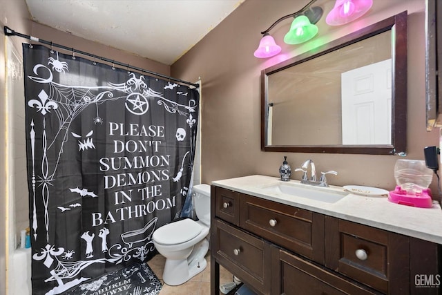 2716 Bladen St, Bakersfield, CA 93309 - full bath with tile patterned floors, vanity, toilet, and a shower with curtain