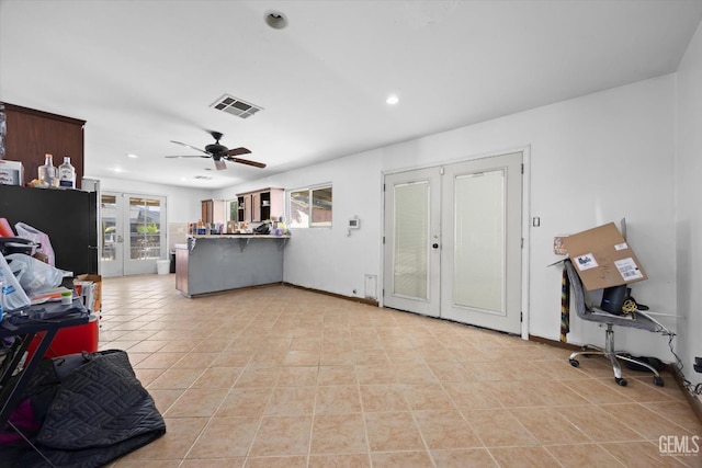 2716 Bladen St, Bakersfield, CA 93309 - living area with french doors, ceiling fan, recessed lighting, and light tile patterned floors