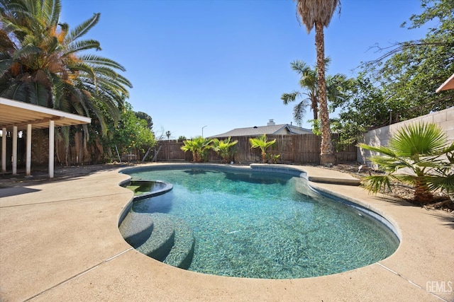 2716 Bladen St, Bakersfield, CA 93309 - view of swimming pool featuring a patio, a fenced backyard, and a pool with connected hot tub
