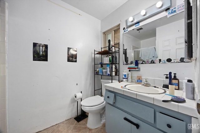 2716 Bladen St, Bakersfield, CA 93309 - full bath featuring a shower stall, toilet, tile patterned flooring, and vanity
