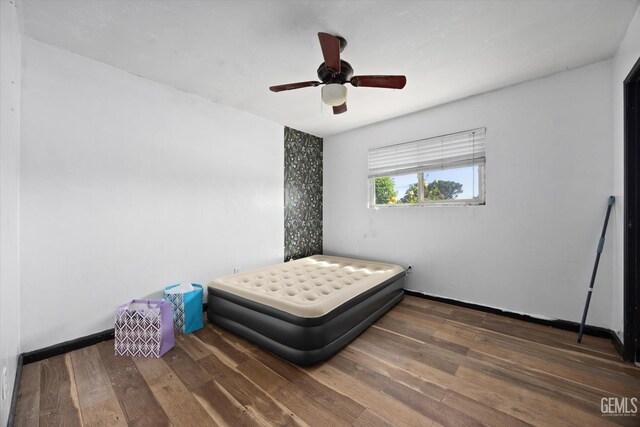 2716 Bladen St, Bakersfield, CA 93309 - bedroom featuring wood finished floors, baseboards, and ceiling fan