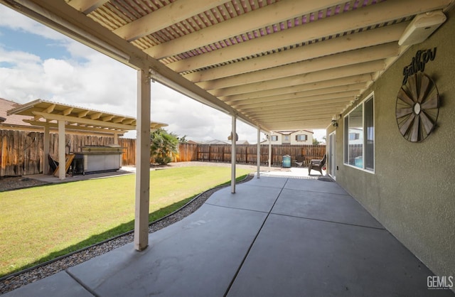 5812 Turquoise Ridge Dr, Bakersfield, CA 93313 - fenced backyard featuring a patio area and a hot tub
